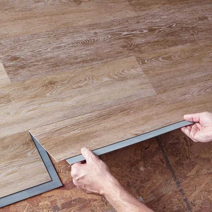 TrafficMaster Khaki Oak 6 in. W x 36 in. L Luxury Vinyl Plank Flooring (24 sq. ft. / case), photo 11 of 15