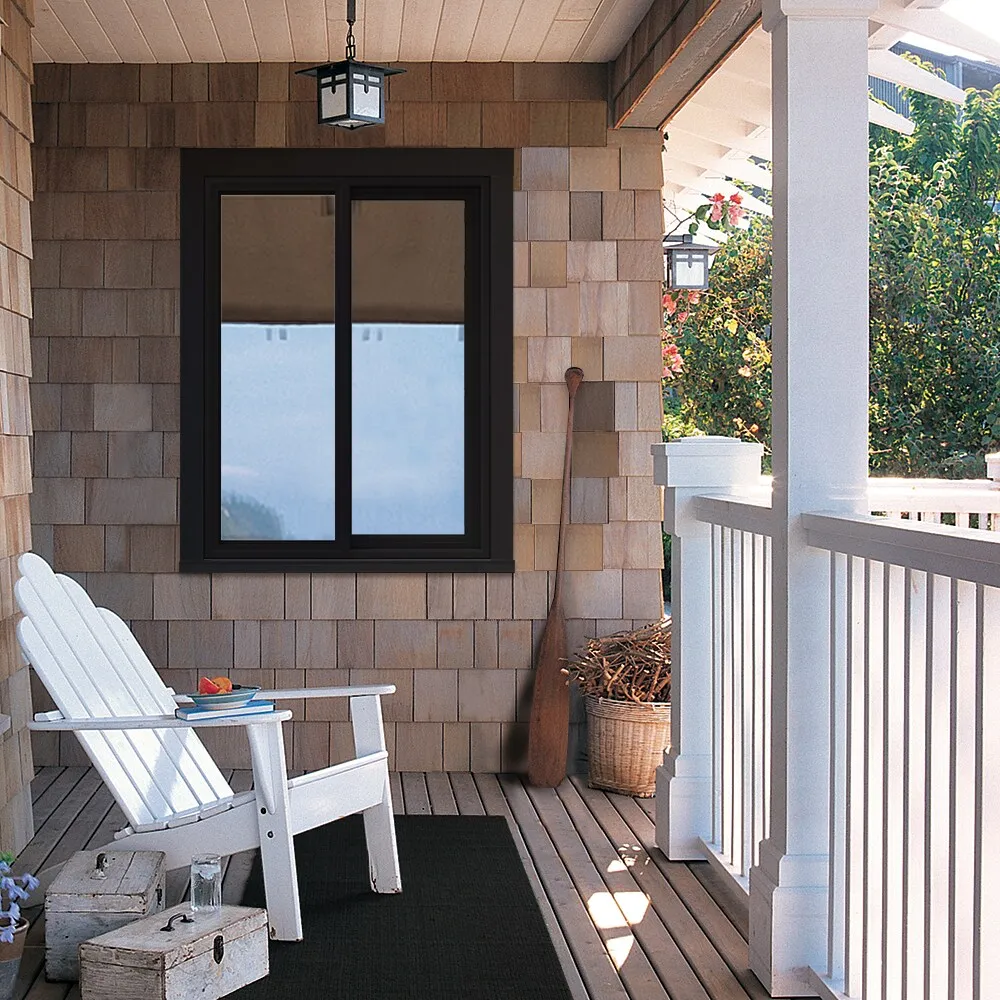 JELD-WEN FiniShield V-4500 35-1/2-in x 47-1/2-in x 3-in Jamb Right-Operable Vinyl Sliding Window, Black Exterior/White Interior, Full Screen Included, photo 3 of 8