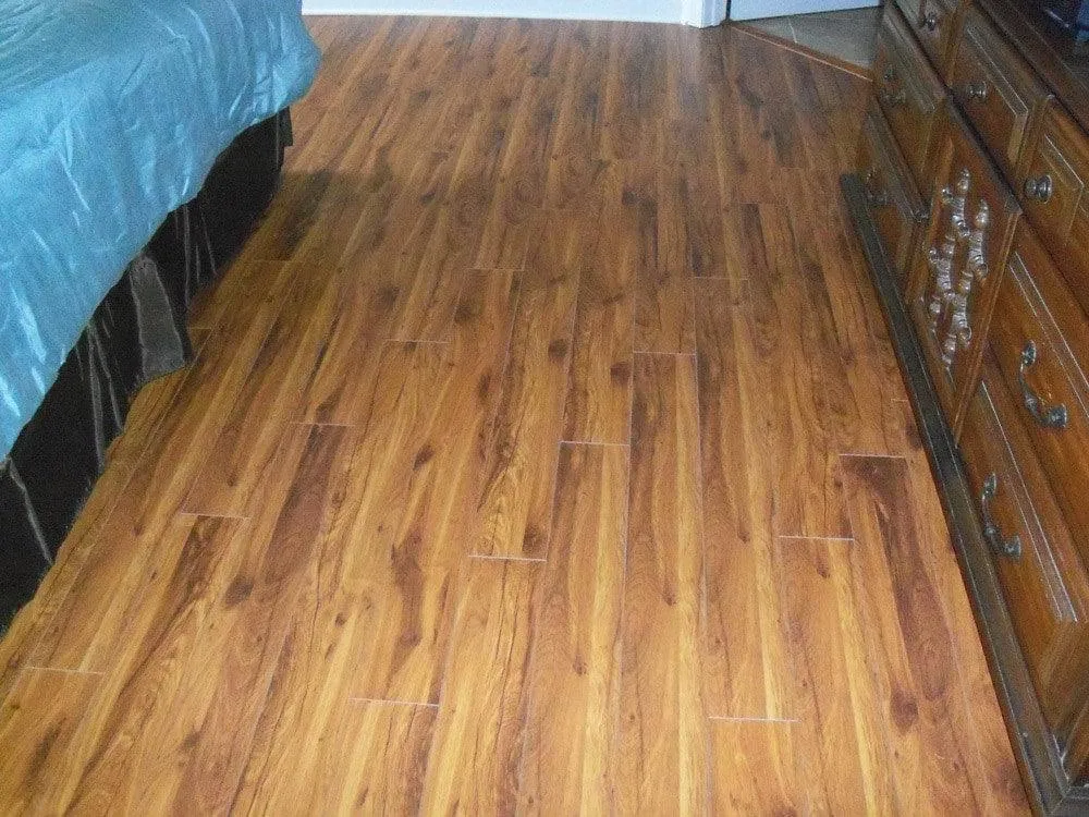 BuildDirect Savannah Cherry 12mm 48" X 5" Laminate Flooring (16.6sq. ft. per box), photo 8 of 10