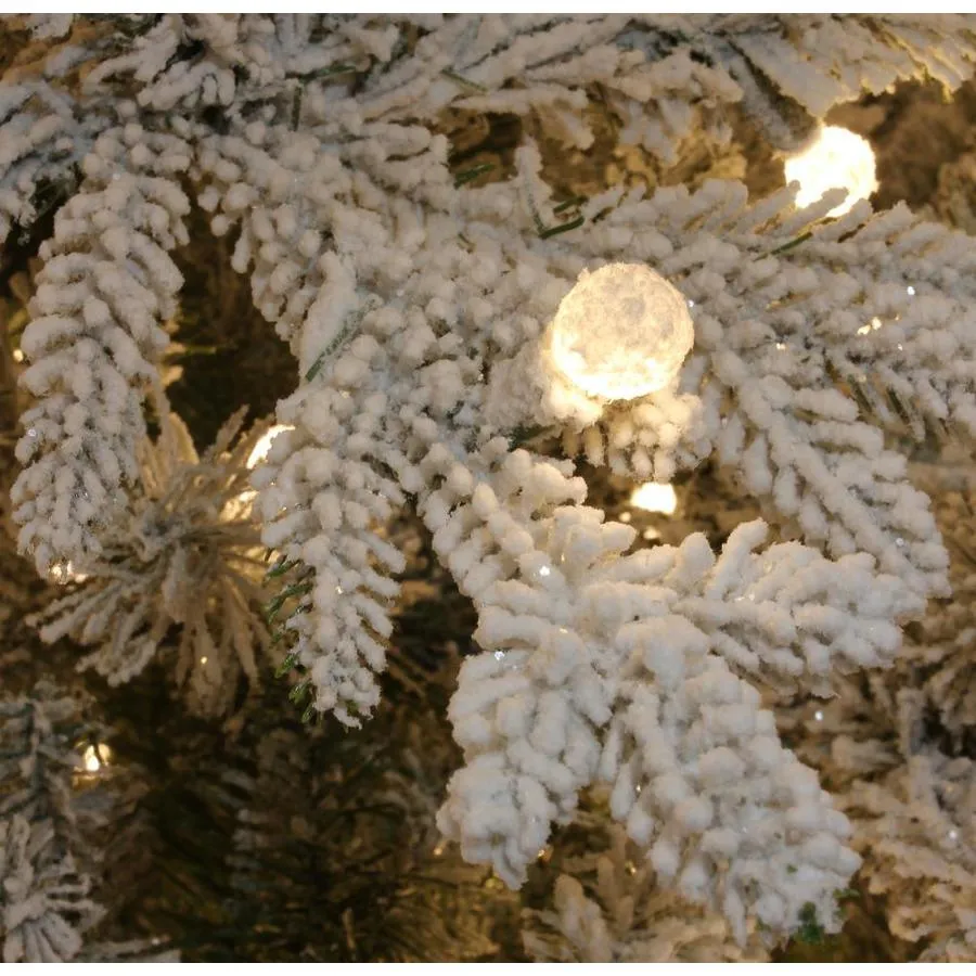 Holiday Living 7.5-ft Essex Fir Pre-Lit Traditional Slim Flocked Artificial Christmas Tree with 400 Constant Warm White LED Lights, photo 3 of 4