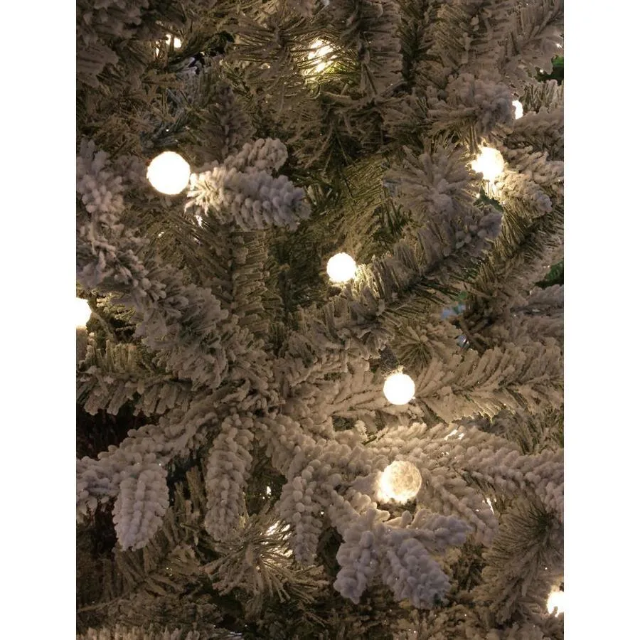 Holiday Living 7.5-ft Essex Fir Pre-Lit Traditional Slim Flocked Artificial Christmas Tree with 400 Constant Warm White LED Lights, photo 2 of 4