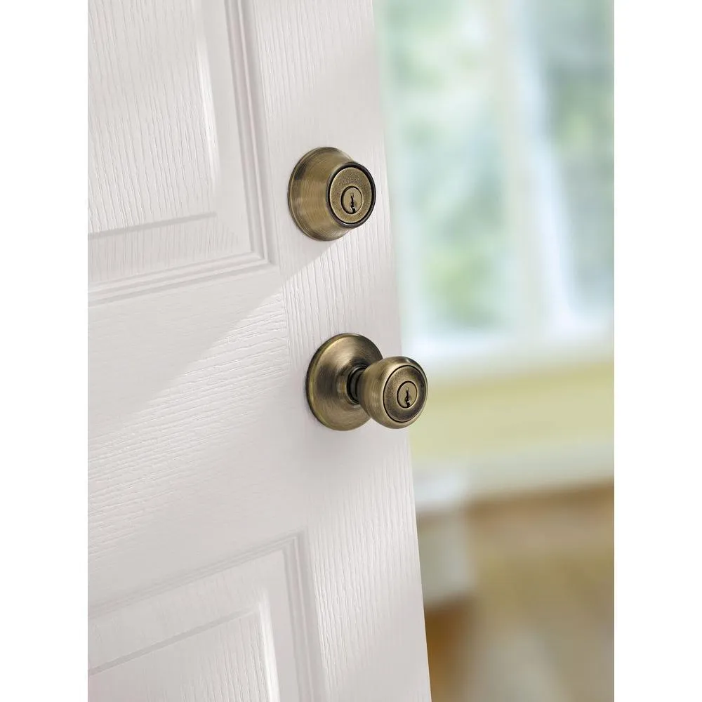 Kwikset Tylo Antique Brass Entry Door Knob and Single Cylinder Deadbolt Combo Pack with Microban Antimicrobial Technology, photo 6 of 9