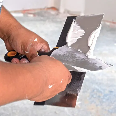 14 in. Stainless Steel Hammer-End Taping Knife with Soft Grip Handle