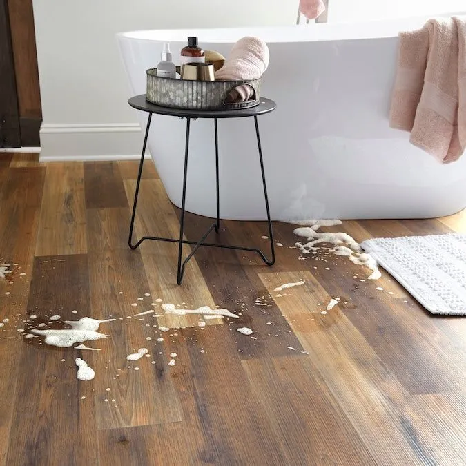 Style Selections Hickory Medley 12-mm T x 6-in W x 50-in L Water Resistant Wood Plank Laminate Flooring (17.07-sq ft / Carton), photo 4 of 7