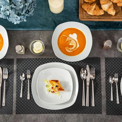 Elisa White Porcelain 18-Piece Casual Ivory WHite Porcelain Dinnerware Set