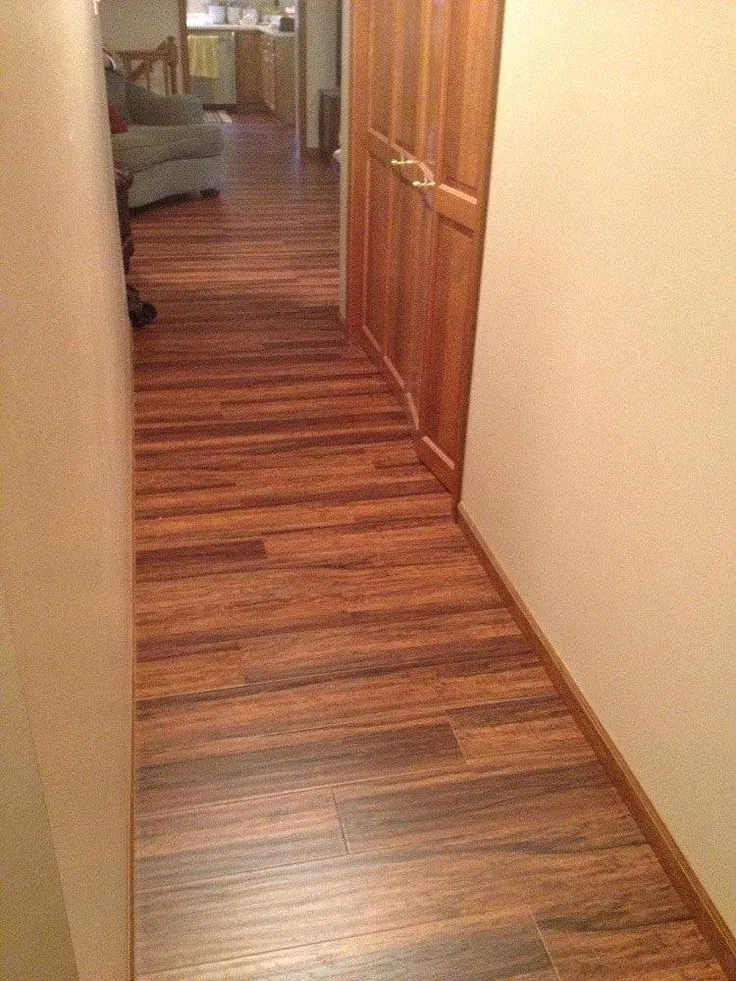 BuildDirect Balinese Rosewood 12mm 48" X 6.5" Laminate Flooring (15.1sq. ft. per box), photo 5 of 11
