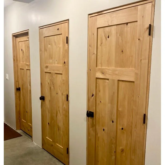 Krosswood Doors 30 in. x 80 in. Krosswood Craftsman 3-Panel Shaker Solid Wood Core Rustic Knotty Alder Interior Door Slab, in a room, photo 14 of 14