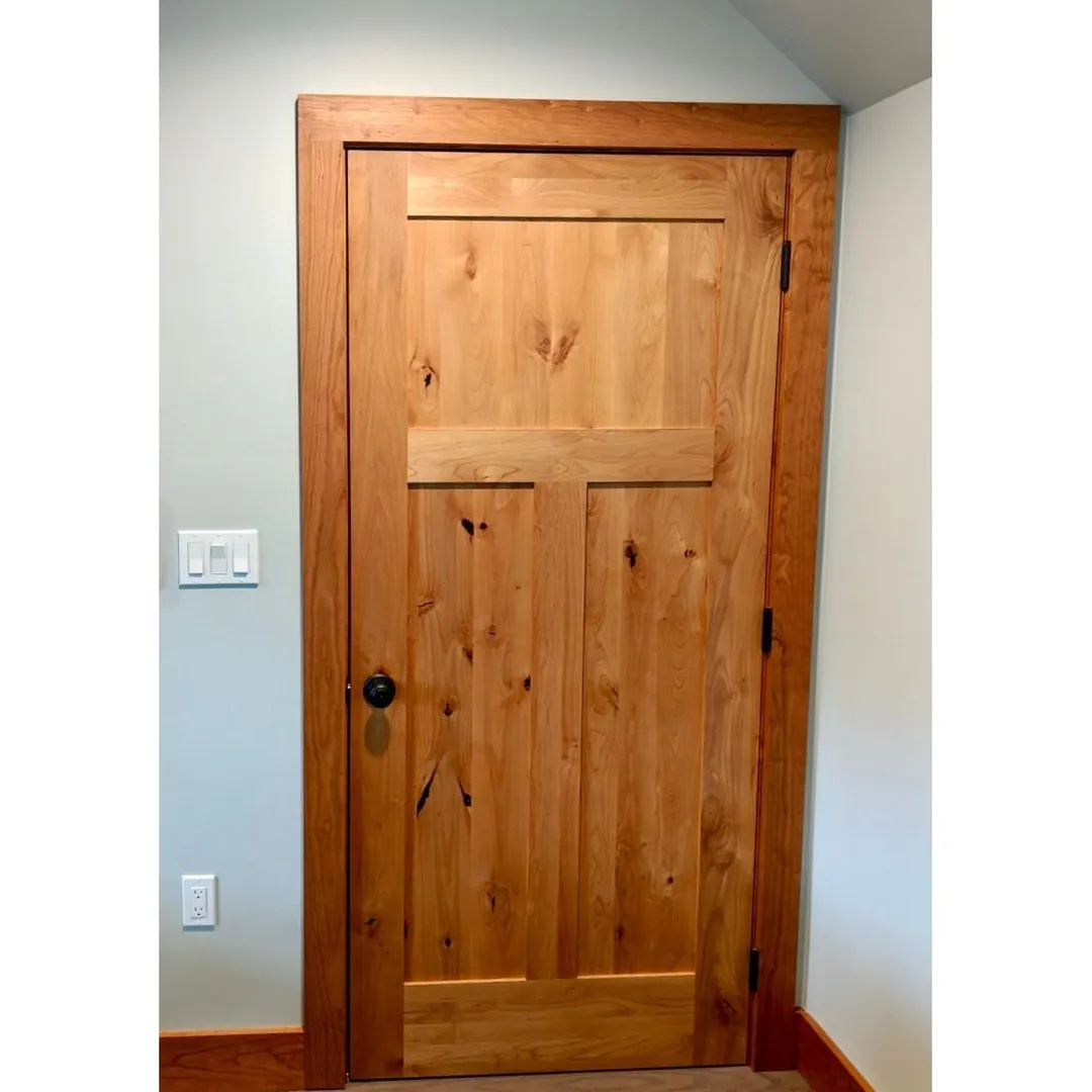 Krosswood Doors 30 in. x 80 in. Krosswood Craftsman 3-Panel Shaker Solid Wood Core Rustic Knotty Alder Interior Door Slab, in a room, photo 12 of 14