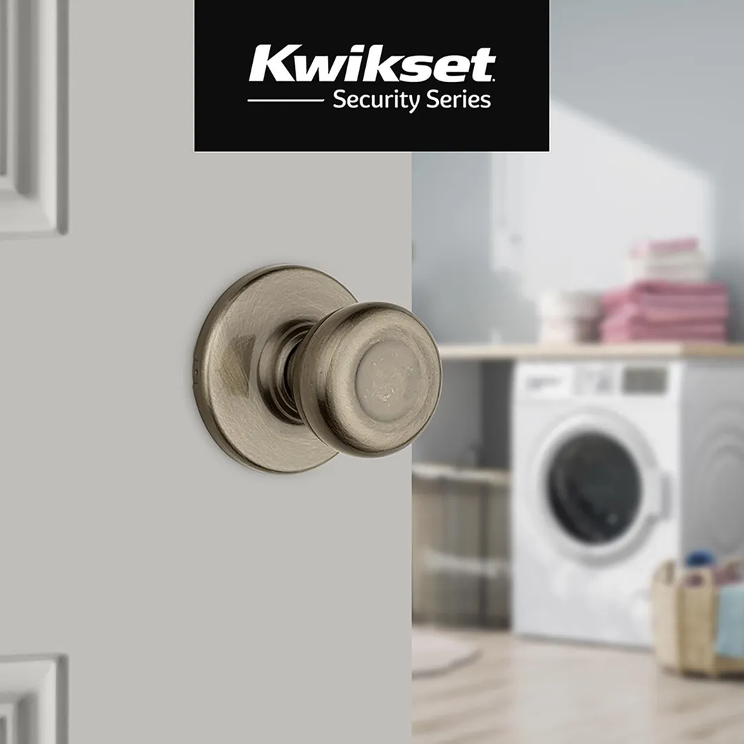 Kwikset Tylo Antique Brass Passage Door Knob, Universal Handing, photo 2 of 8